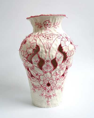 Photo of an embroidered ceramic vase