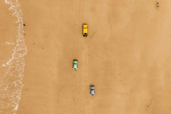 Photo of three TBug Baja VW Beetles from above