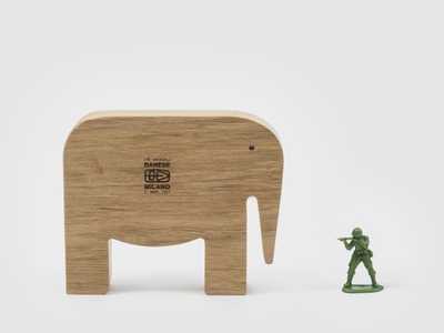 A toy soldier hunting a puzzle elephant