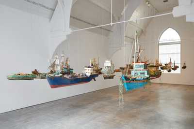 Photo of boat sculptures hanging in mid air