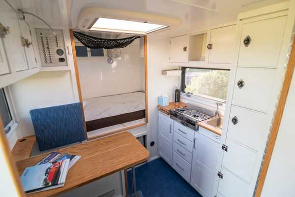 Kitchen and sleeping area of the camper