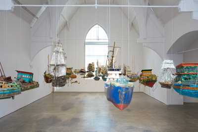 Photo of boat sculptures hanging in mid air
