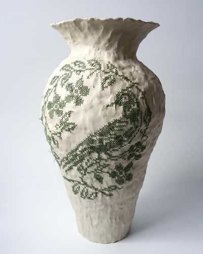 Photo of an embroidered ceramic vase