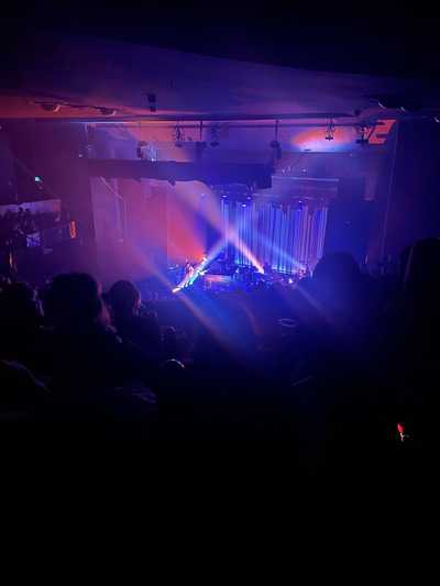 Concert with rainbow lighting
