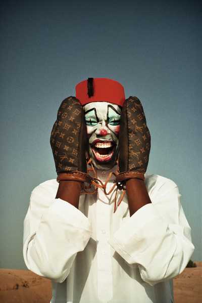 Portrait of a man, dressed like a clown