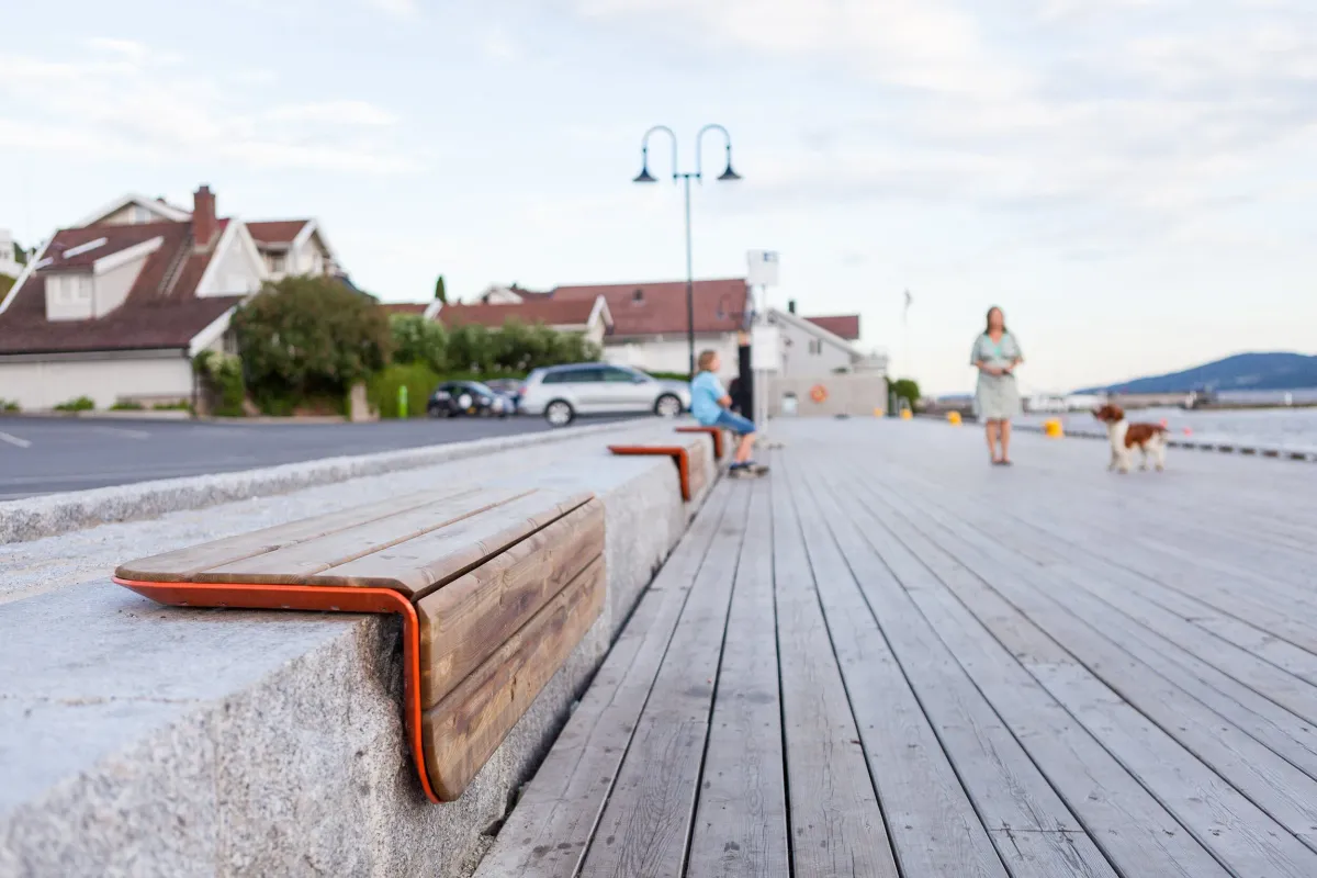 Wooden bench on top of concrete