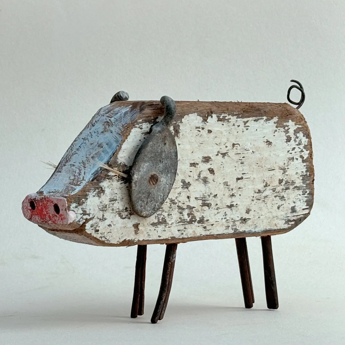 Driftwood pig sculpture