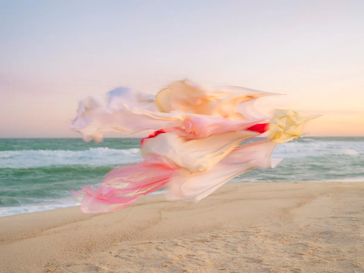 Photograph of cloth blowing in the wind