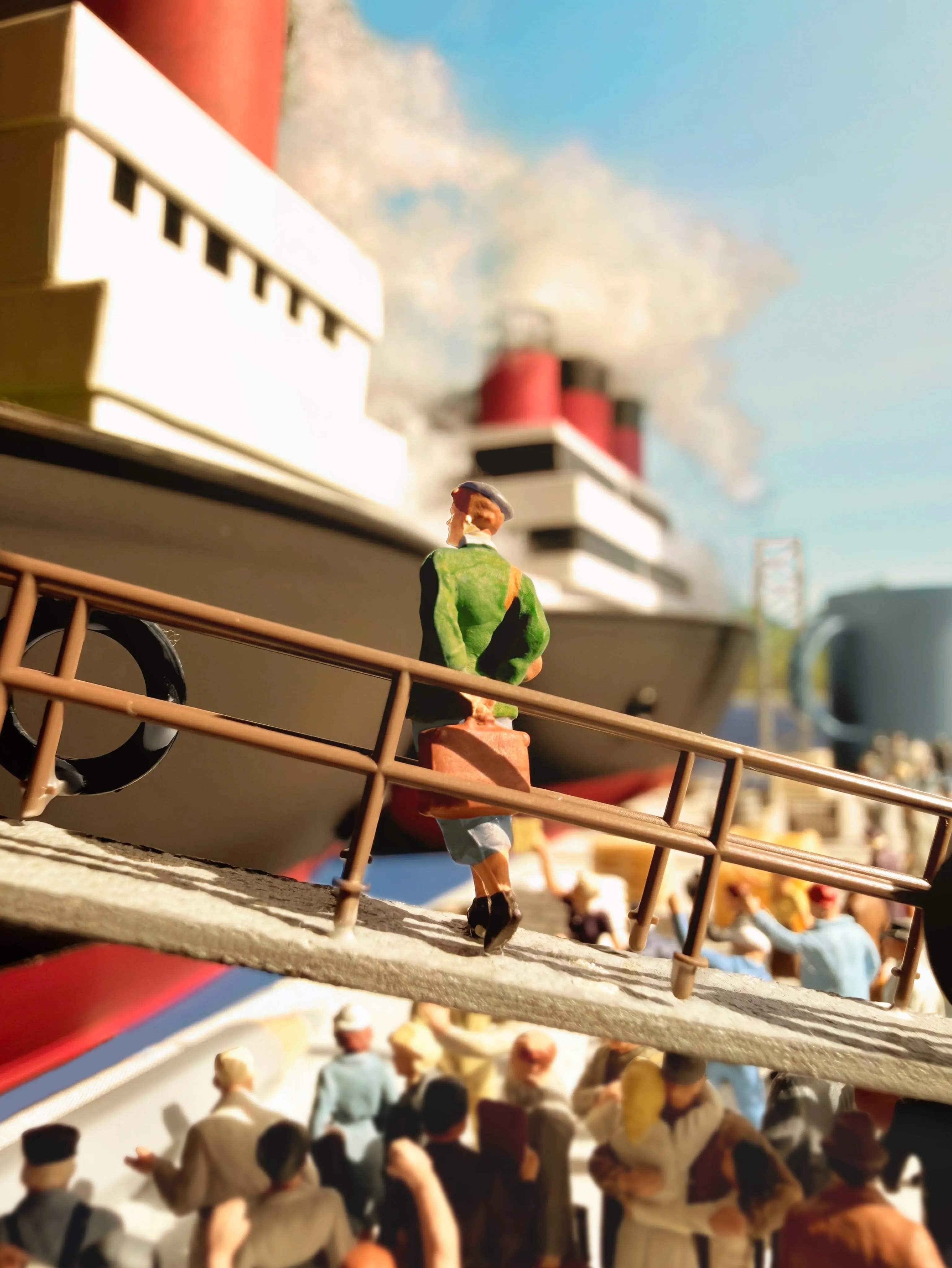 Model of a man boarding a ship